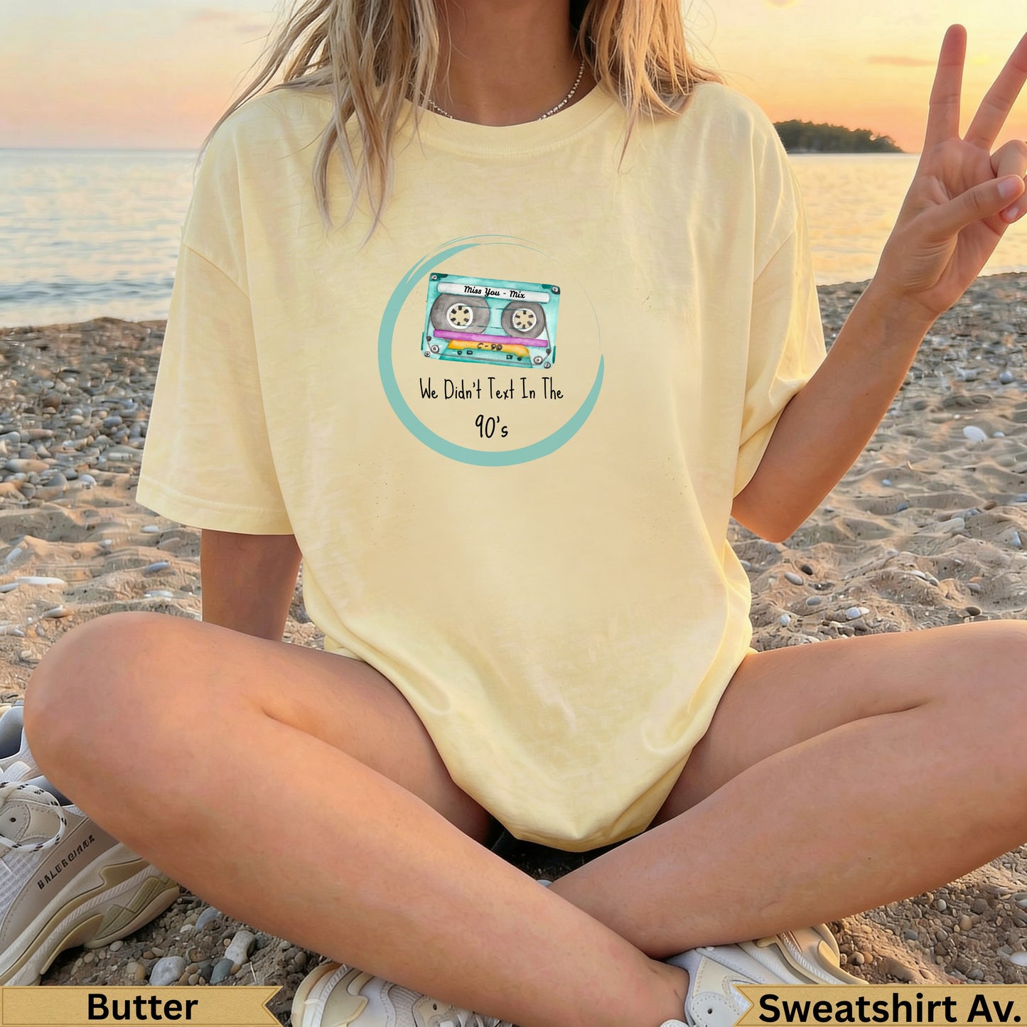 Yellow graphic sweatshirt with "We Didn't Text In The 90's" cassette tape design.