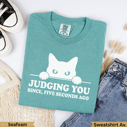Teal t-shirt with white cat graphic, "Judging You Since, Five Seconds Ago" text.