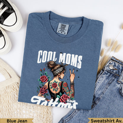 Blue jean sweatshirt with "Cool Moms Have Tattoos" graphic and roses.