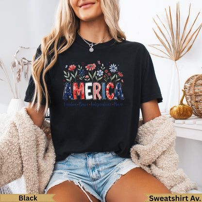 Black t-shirt with "AMERICA" in floral, American flag design and text.