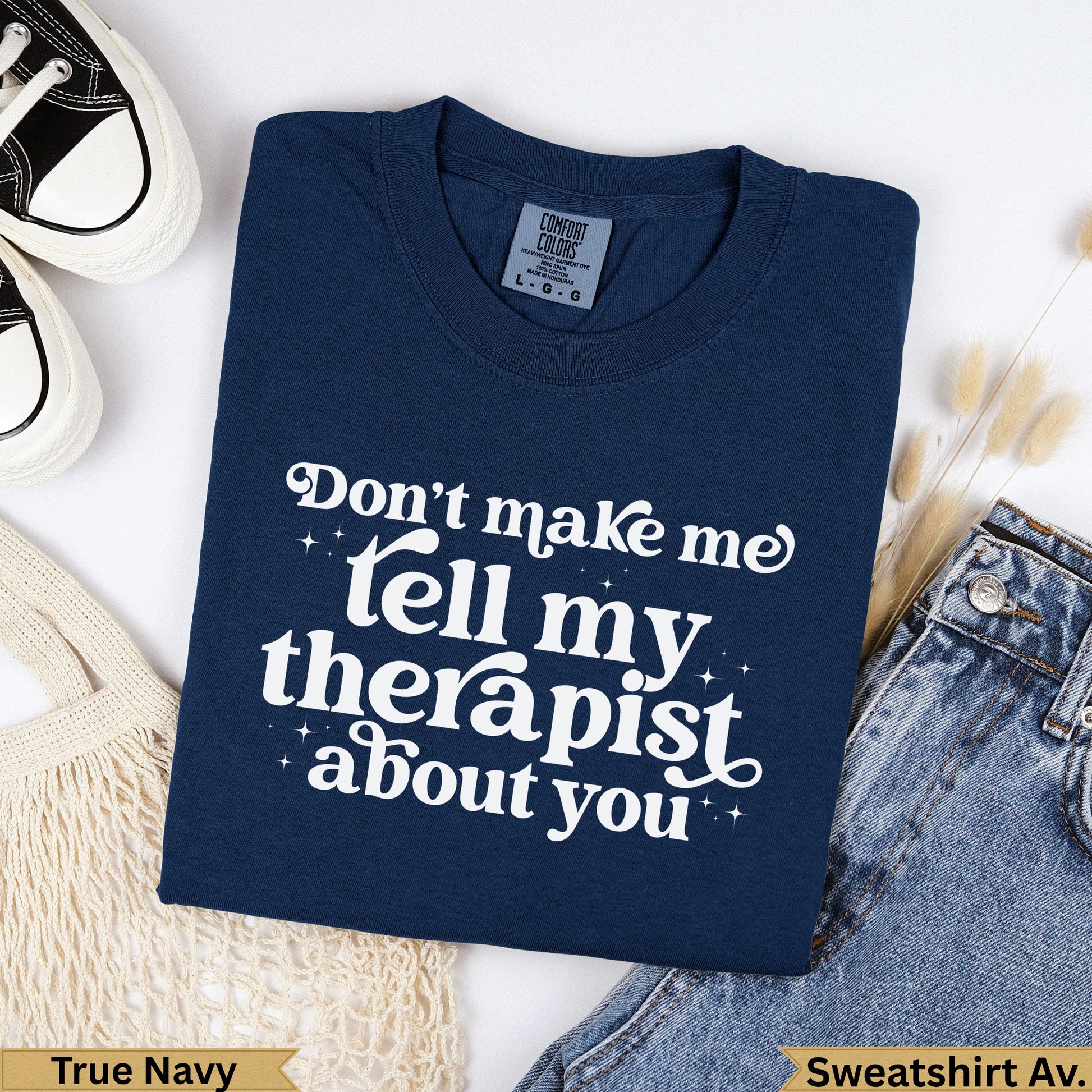 Navy blue t-shirt with "Don't make me tell my therapist about you" text.