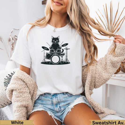 Black cat playing drums graphic on white t-shirt.
