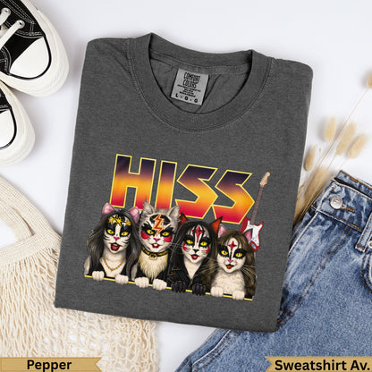 Four cats with punk rock makeup and accessories, on a charcoal t-shirt that says "HISS".