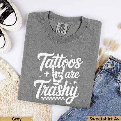 Grey t-shirt with "Tattoos are Trashy" text and checkered pattern.