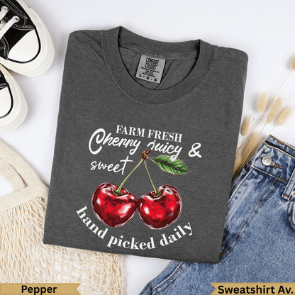 Dark grey t-shirt with "Farm Fresh Cherry Juicy & Sweet Hand Picked Daily" text.