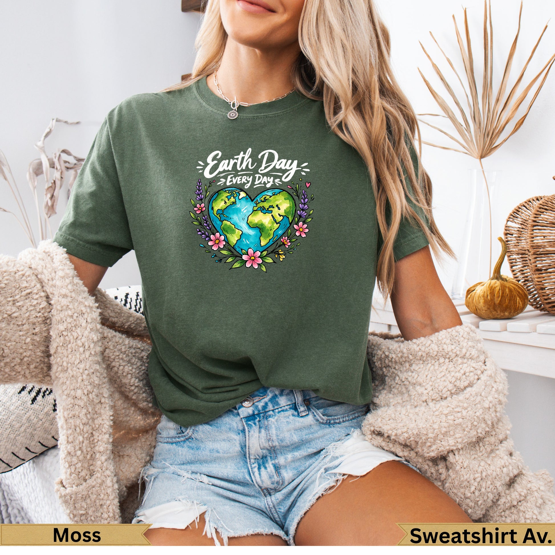 Green t-shirt with Earth heart design and "Earth Day Every Day" text.