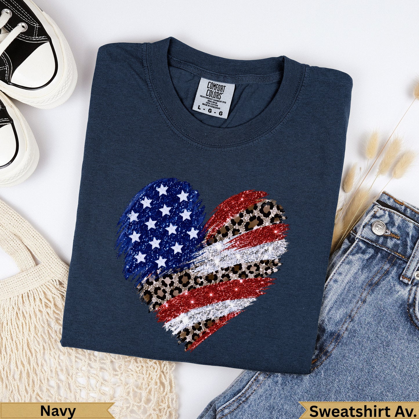 Navy t-shirt with glitter and leopard print heart graphic.