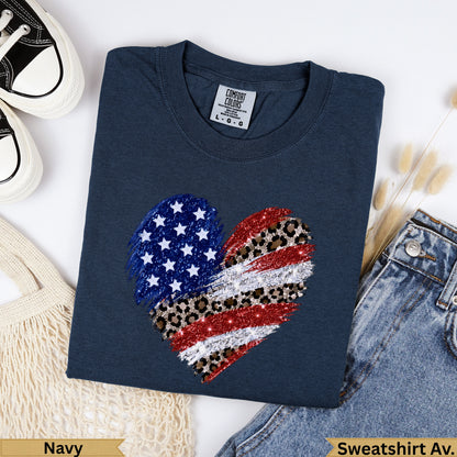 Navy t-shirt with glitter and leopard print heart graphic.