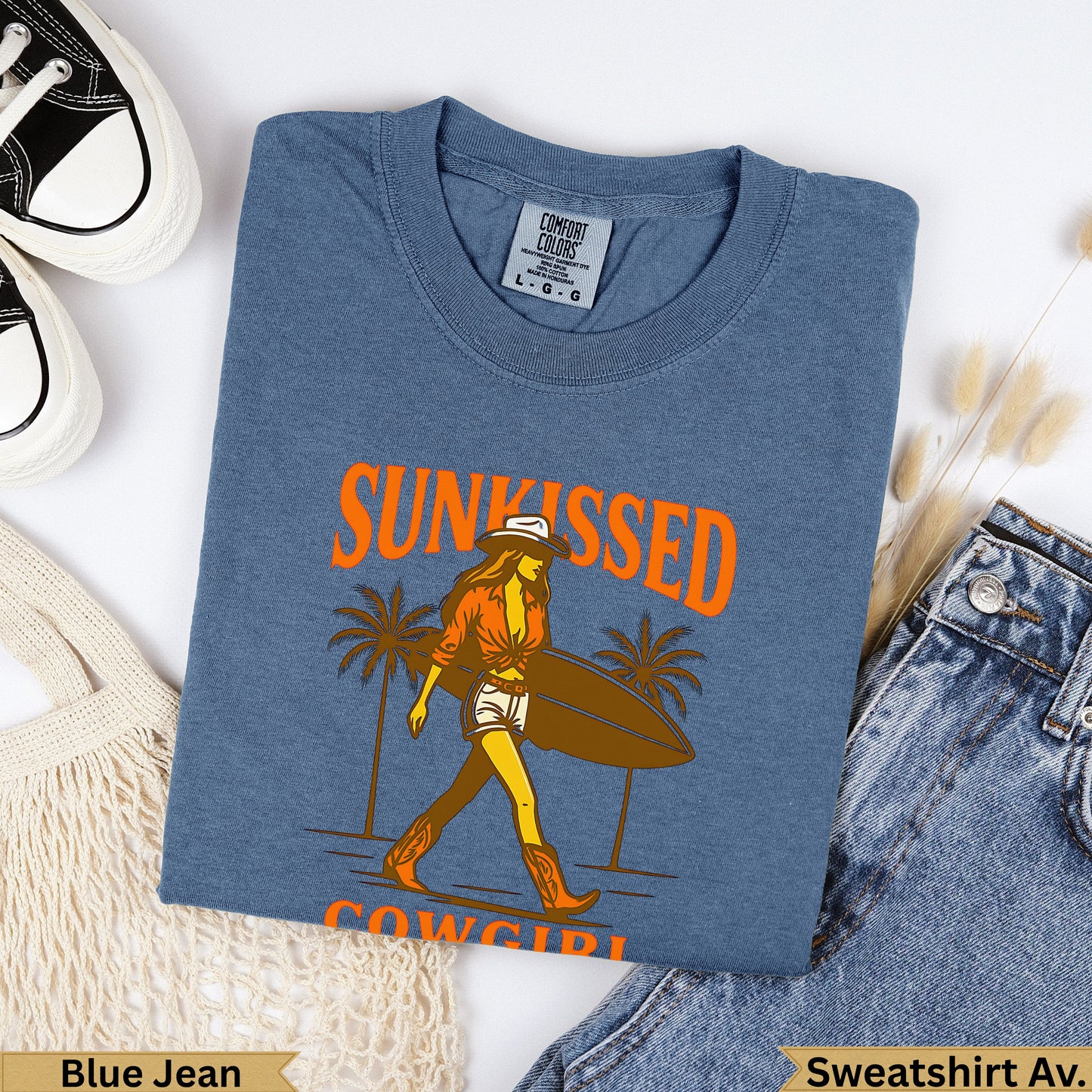 Blue Jean sweatshirt with "Sunkissed Cowgirl" text and graphic.