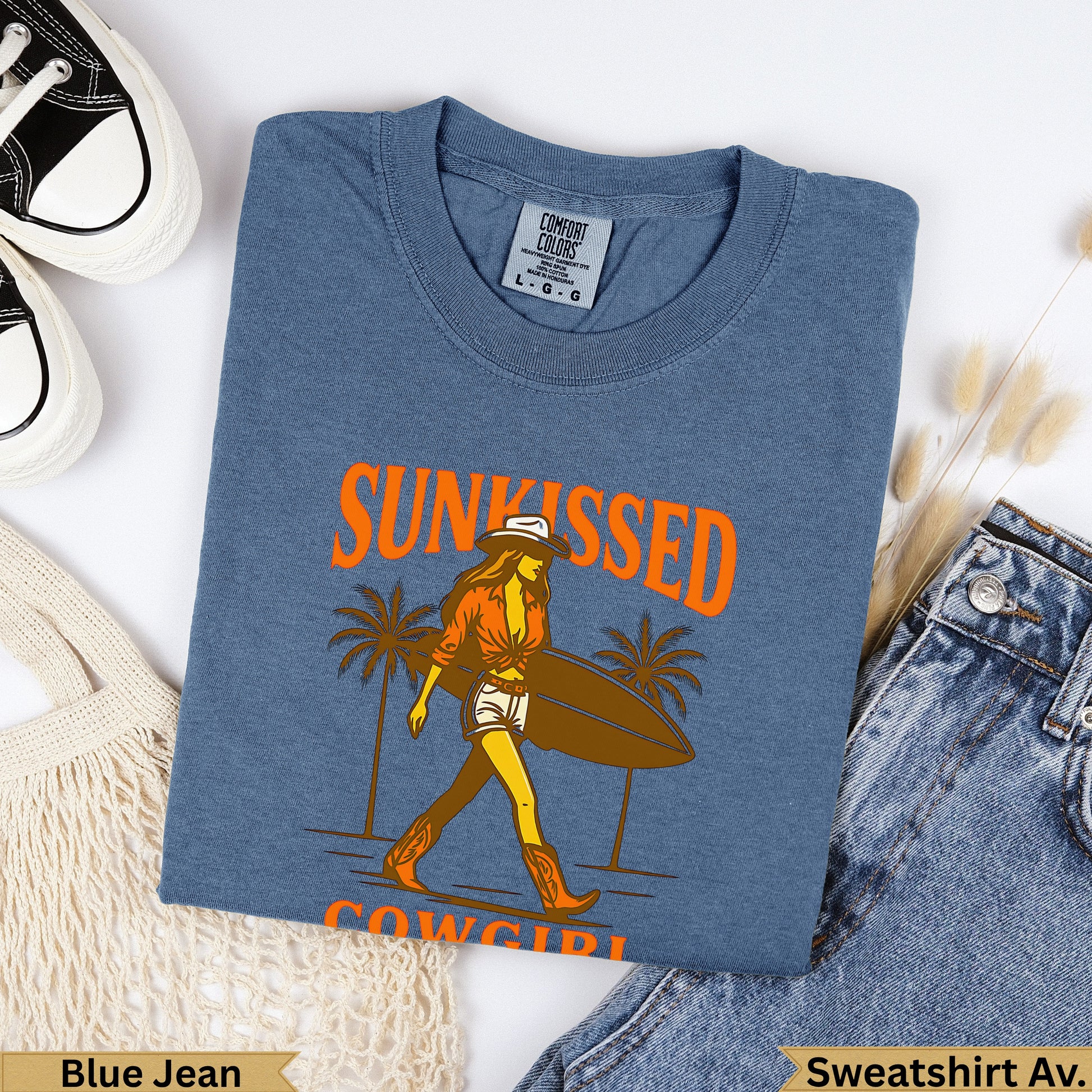 Blue Jean sweatshirt with "Sunkissed Cowgirl" text and graphic.