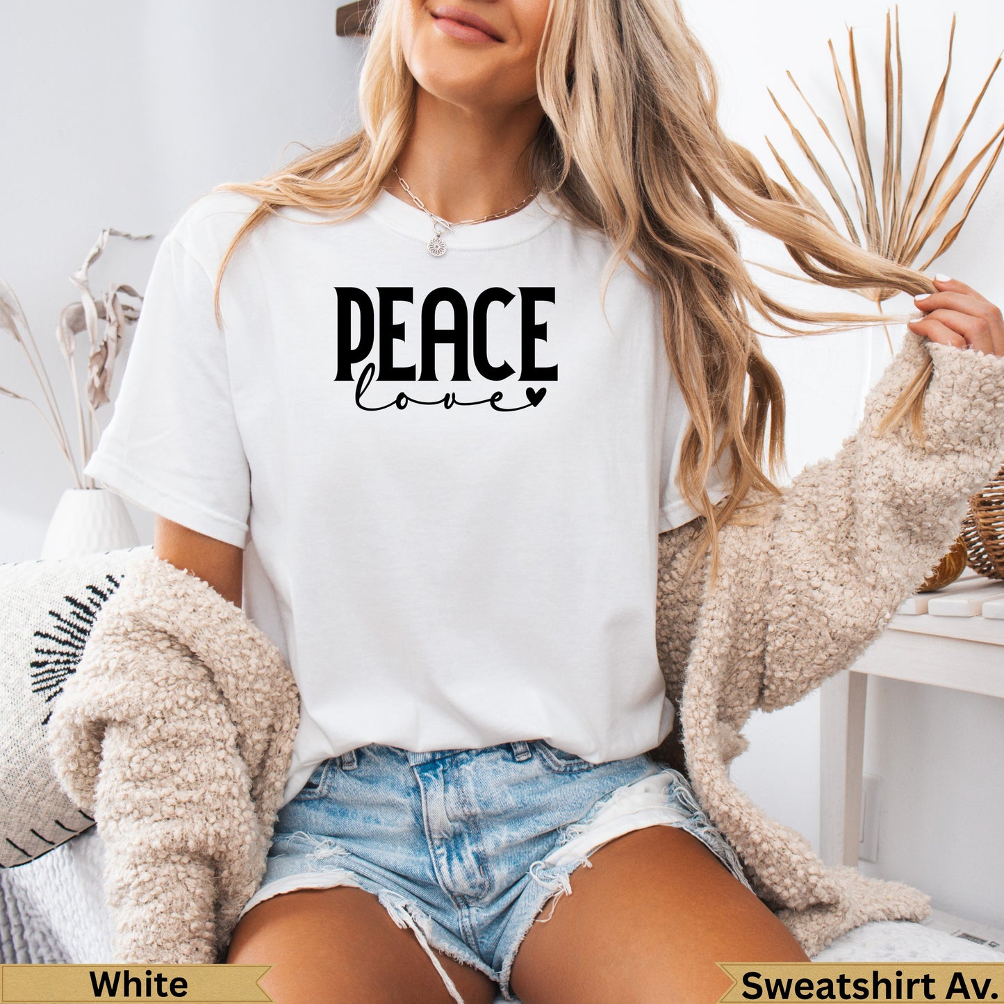 White crewneck t-shirt with "PEACE love" graphic.