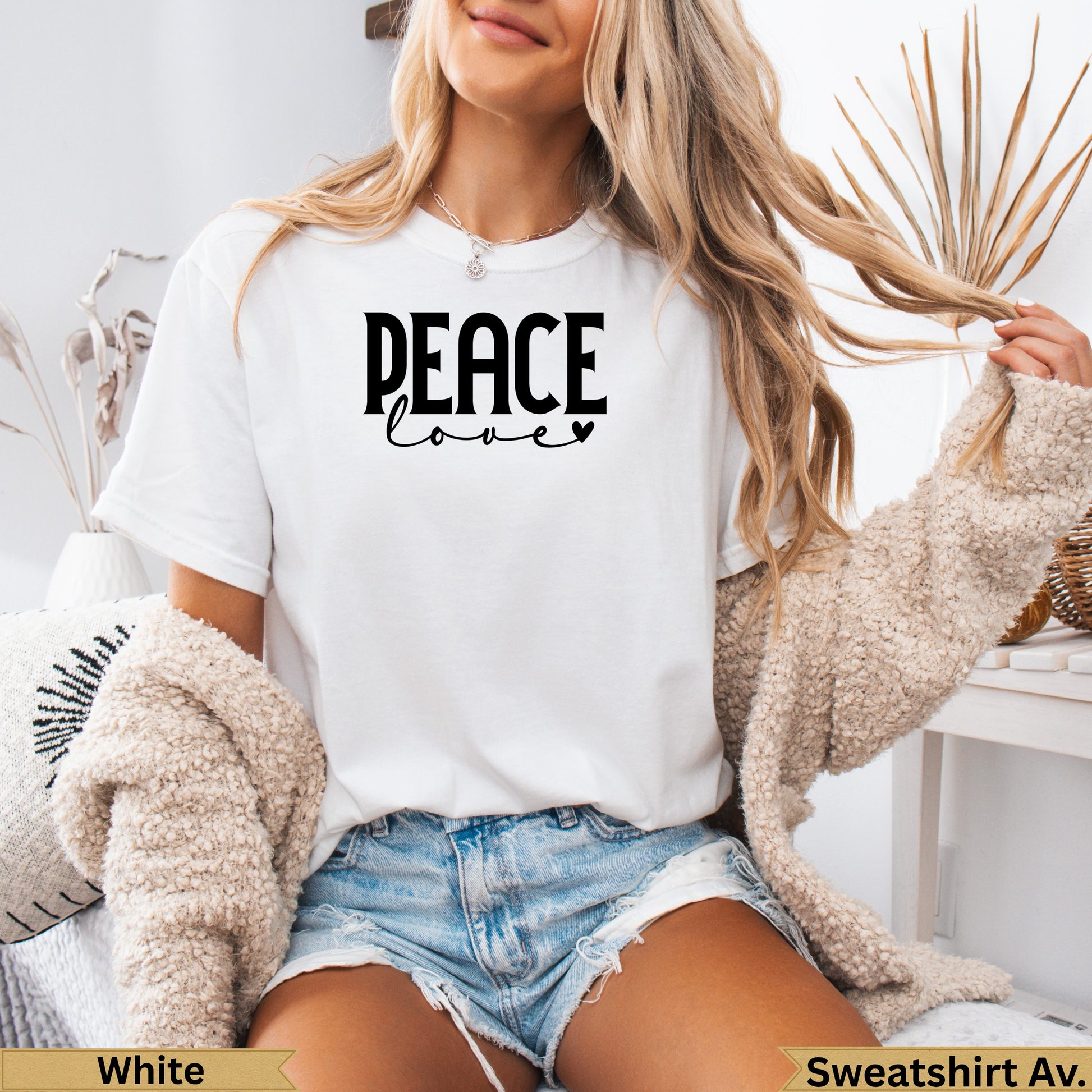 White crewneck t-shirt with "PEACE love" graphic.