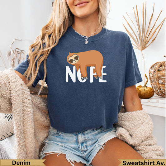 Navy t-shirt with a brown sloth hanging above the word "NOPE".