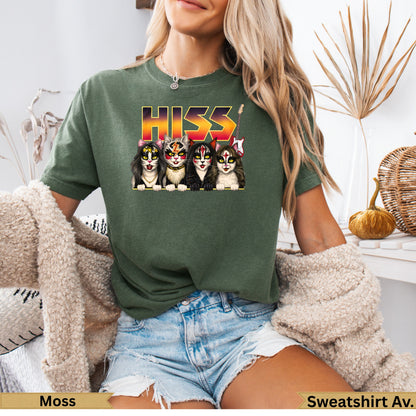 Four cats in KISS makeup stand before a "HISS" logo and guitar.