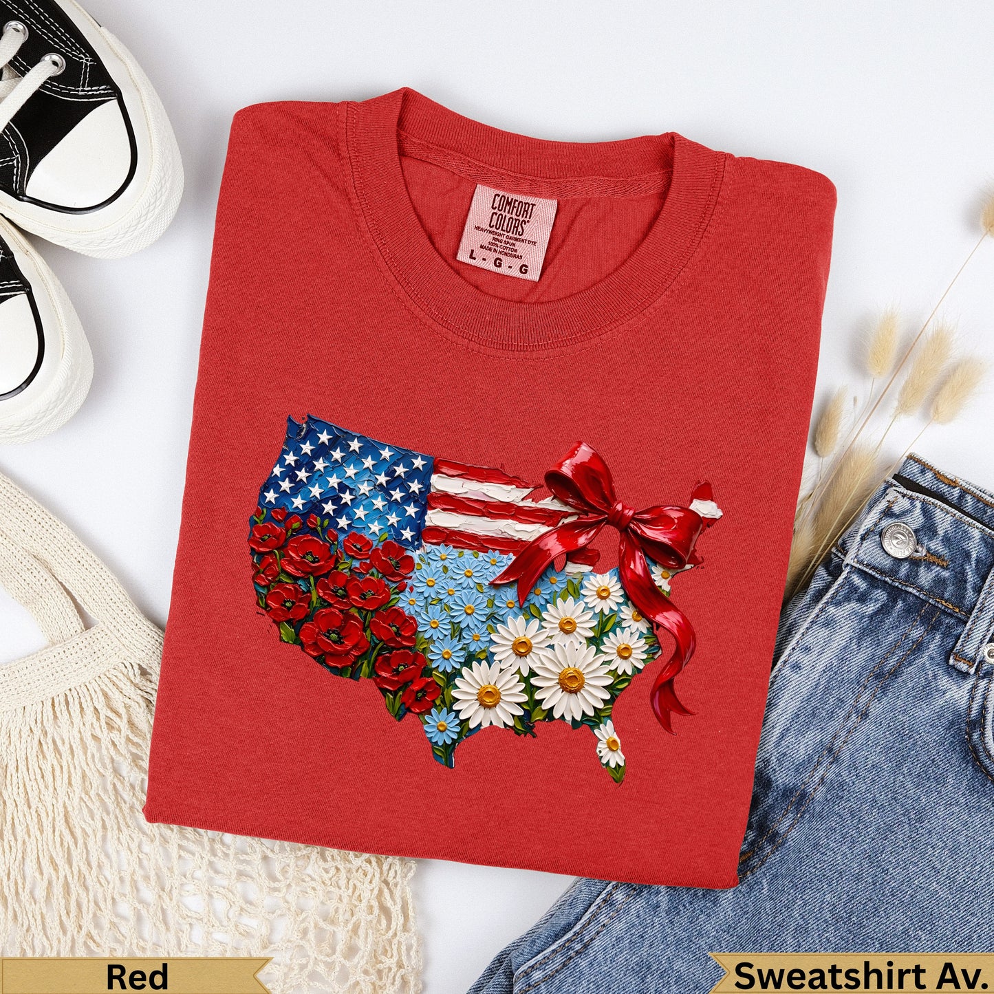Red t-shirt with US map art made of flowers and a bow.