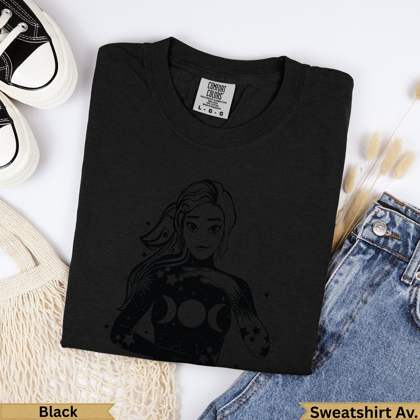 Black Comfort Colors heavyweight cotton t-shirt with moon phase graphic.