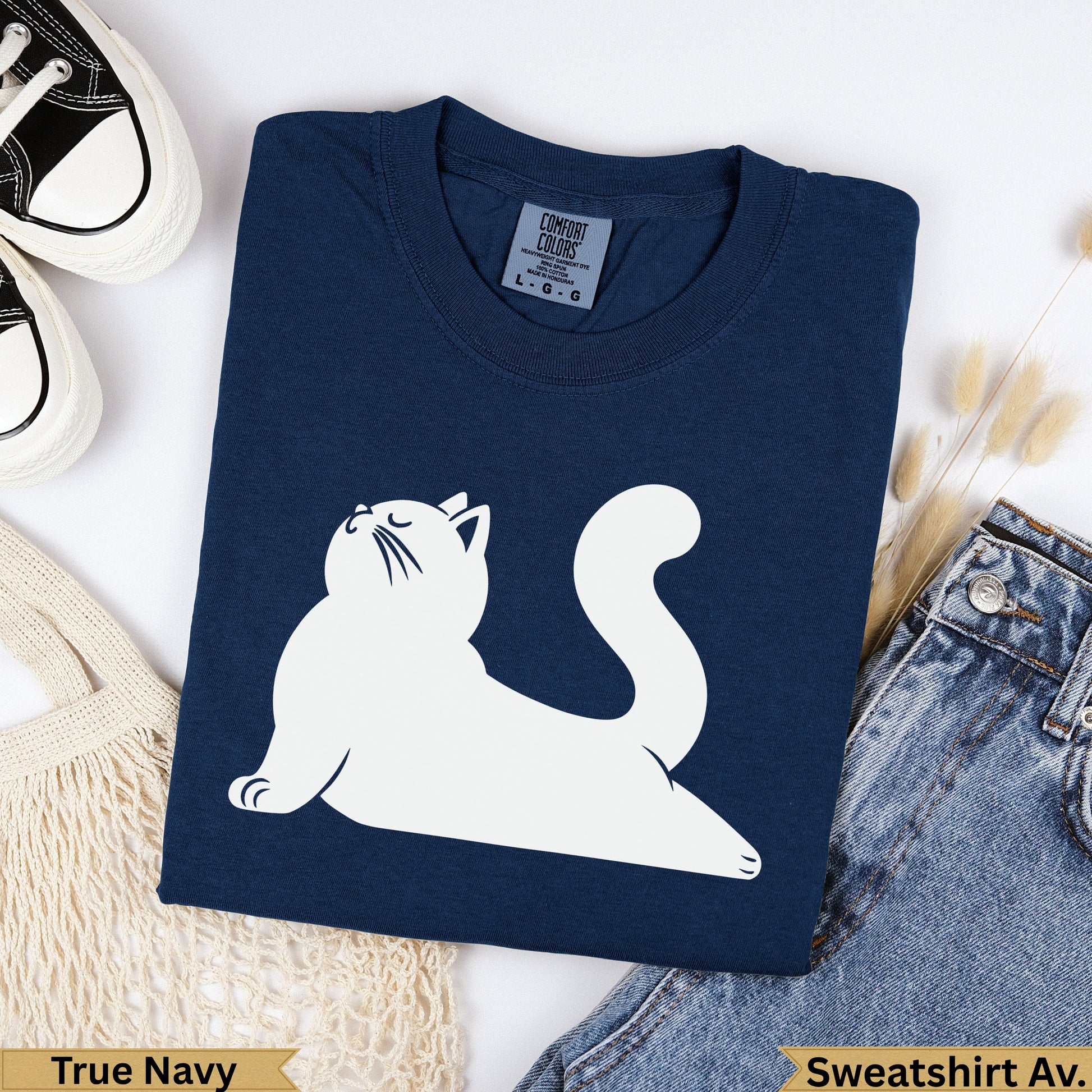 Navy blue sweatshirt with a white cat graphic, "True Navy" text.
