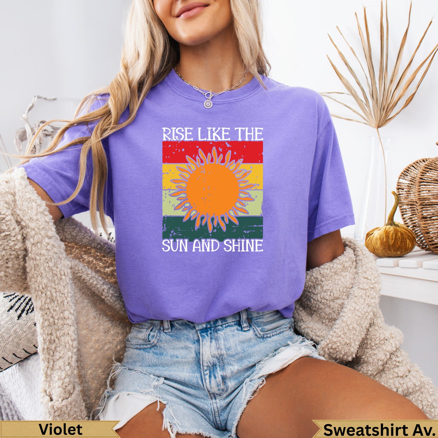 Purple t-shirt with sun and "Rise Like the Sun and Shine" text.