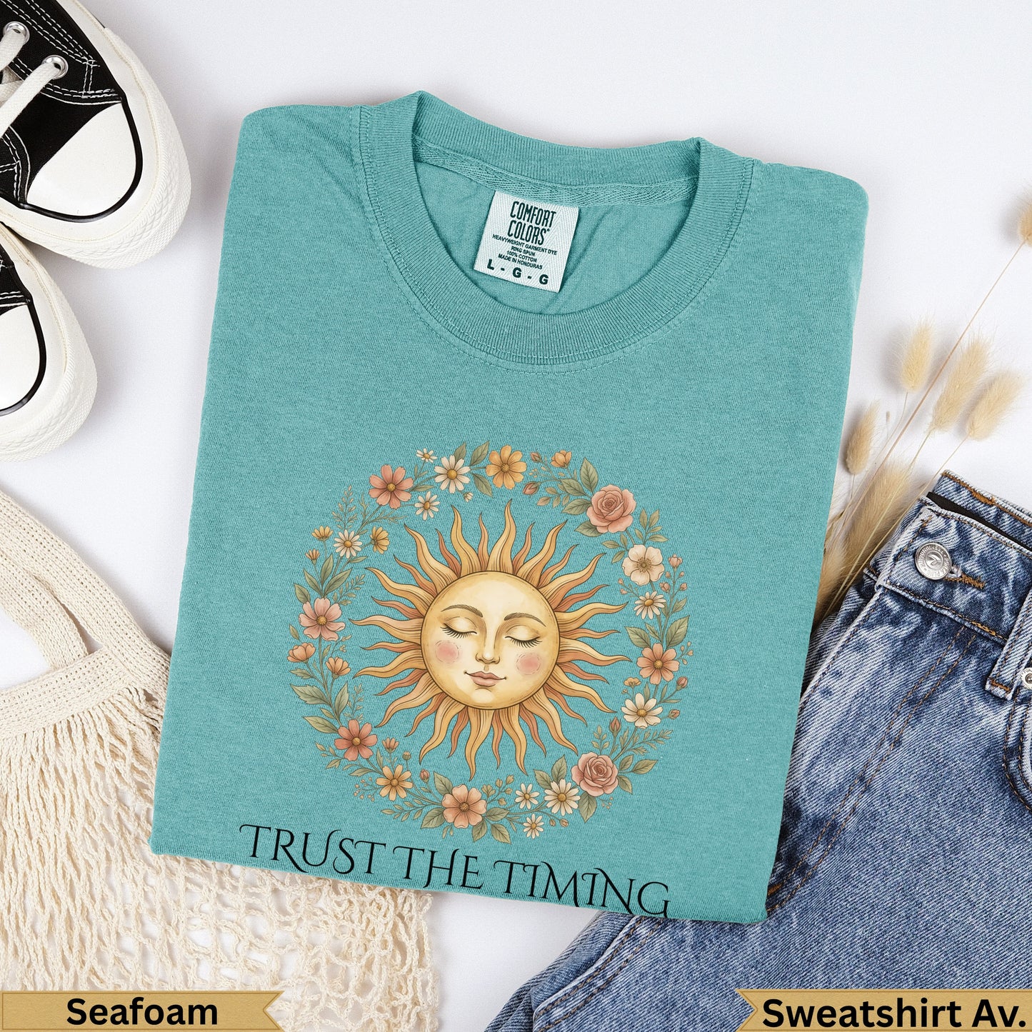 Teal Comfort Colors t-shirt with a sun and floral wreath design, text "TRUST THE TIMING".