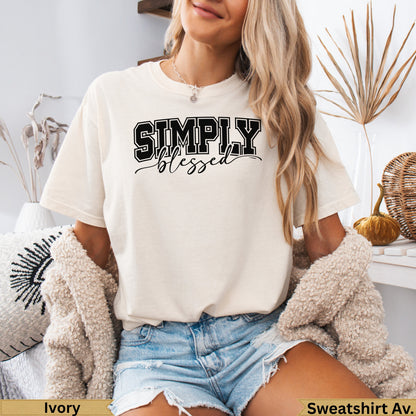 Cream t-shirt with "SIMPLY blessed" text in black and white lettering.