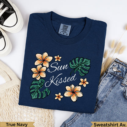Navy t-shirt with "Sun Kissed" text and floral design.
