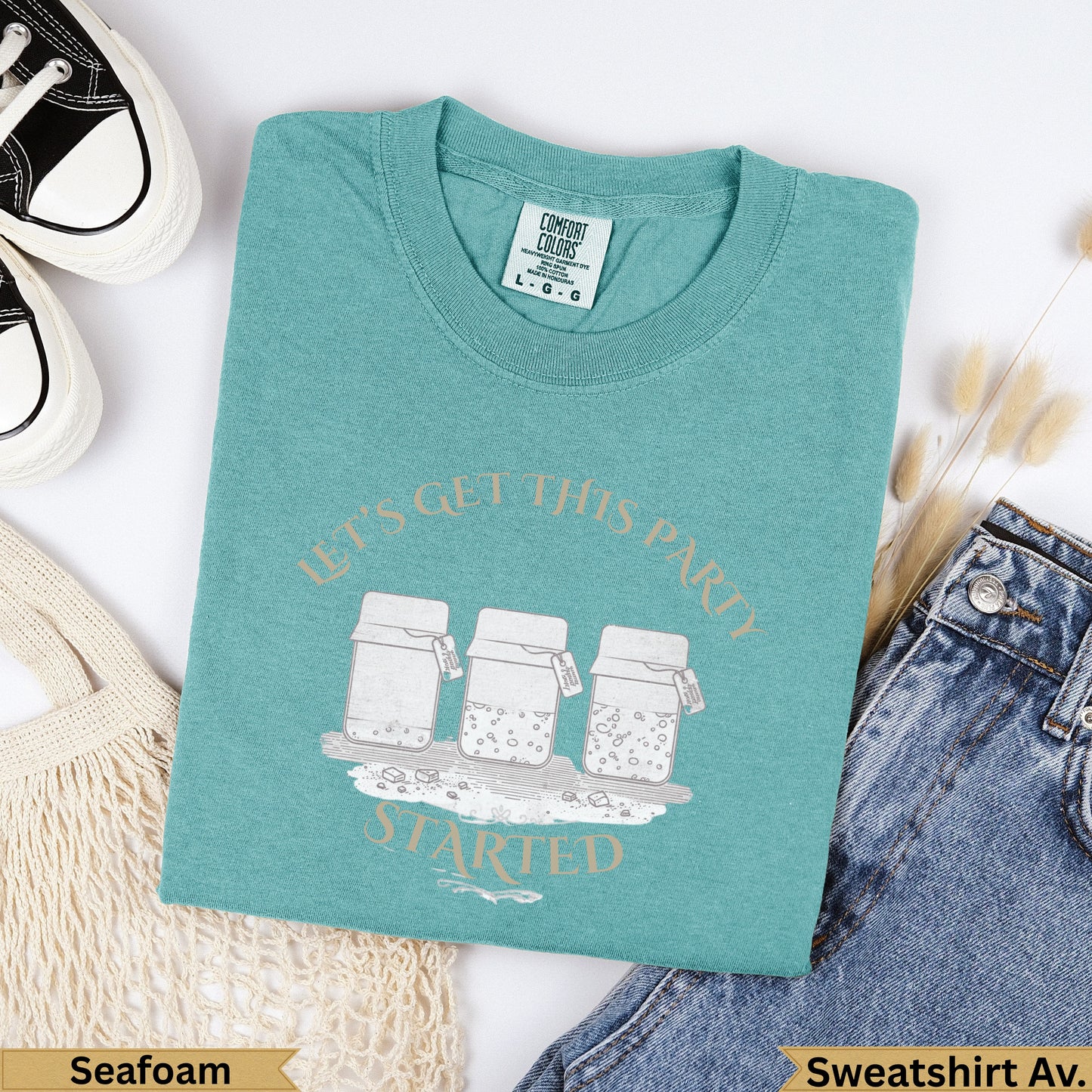 Teal t-shirt with "Let's Get This Party Started" and three jars graphic.