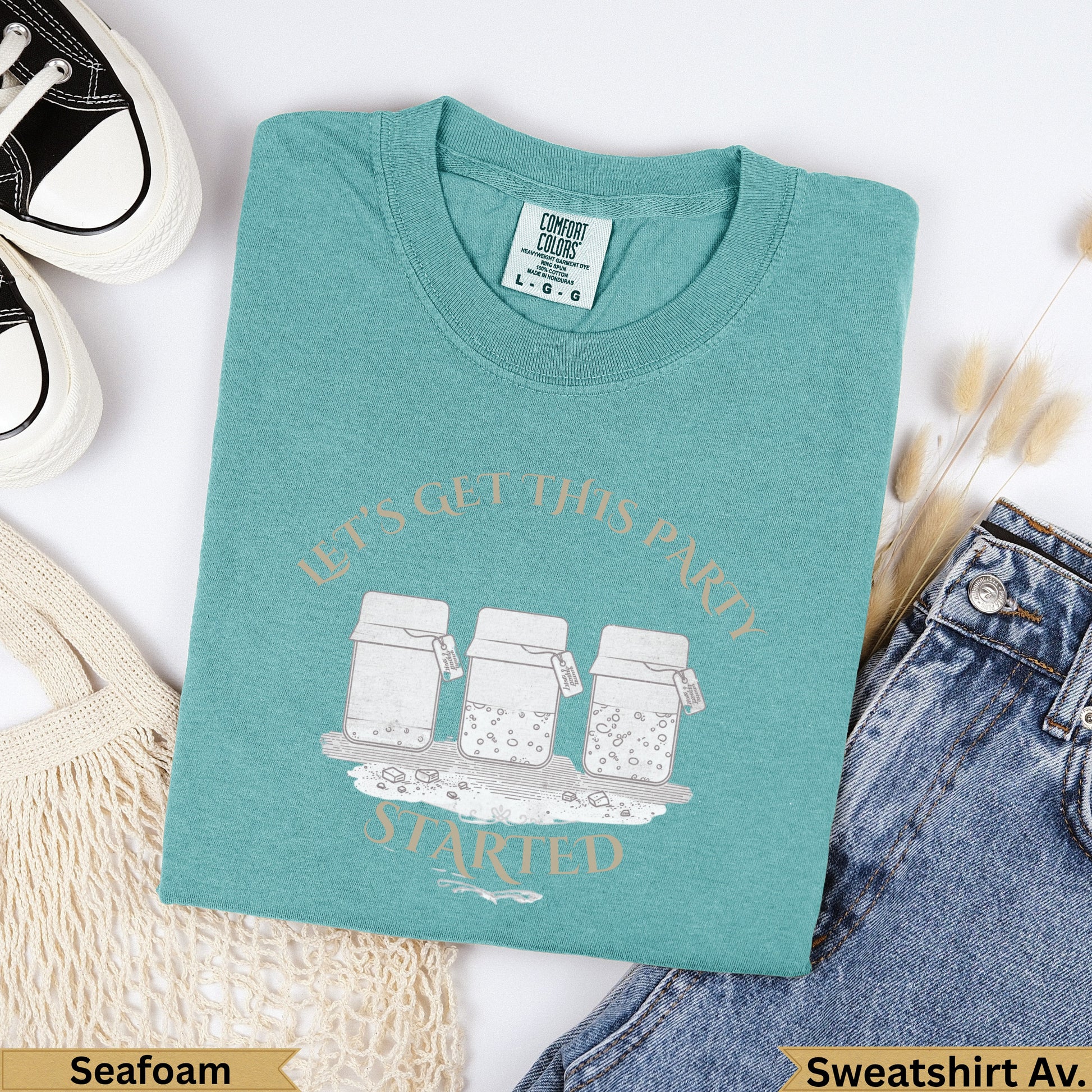 Teal t-shirt with "Let's Get This Party Started" and three jars graphic.