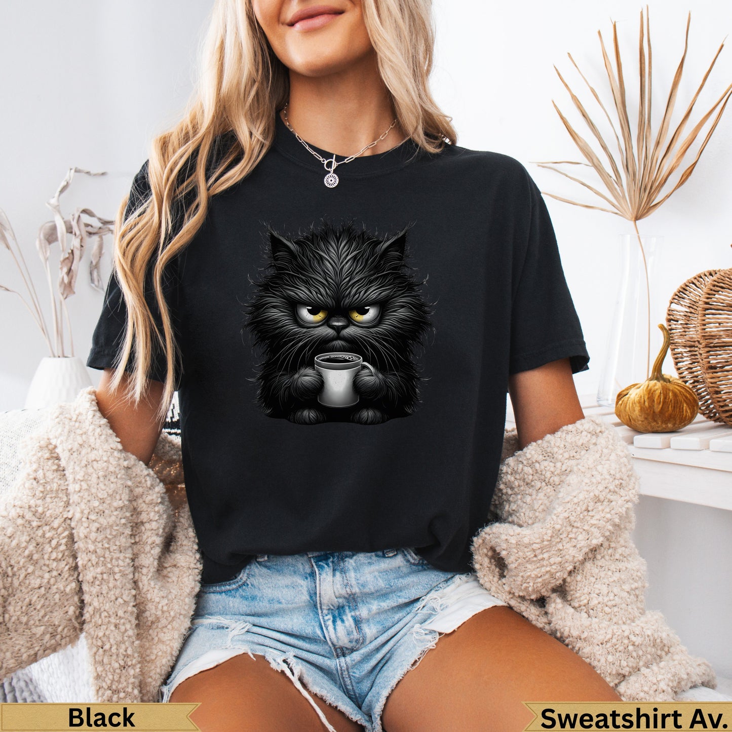 Black graphic t-shirt with fluffy black cat holding a coffee mug.