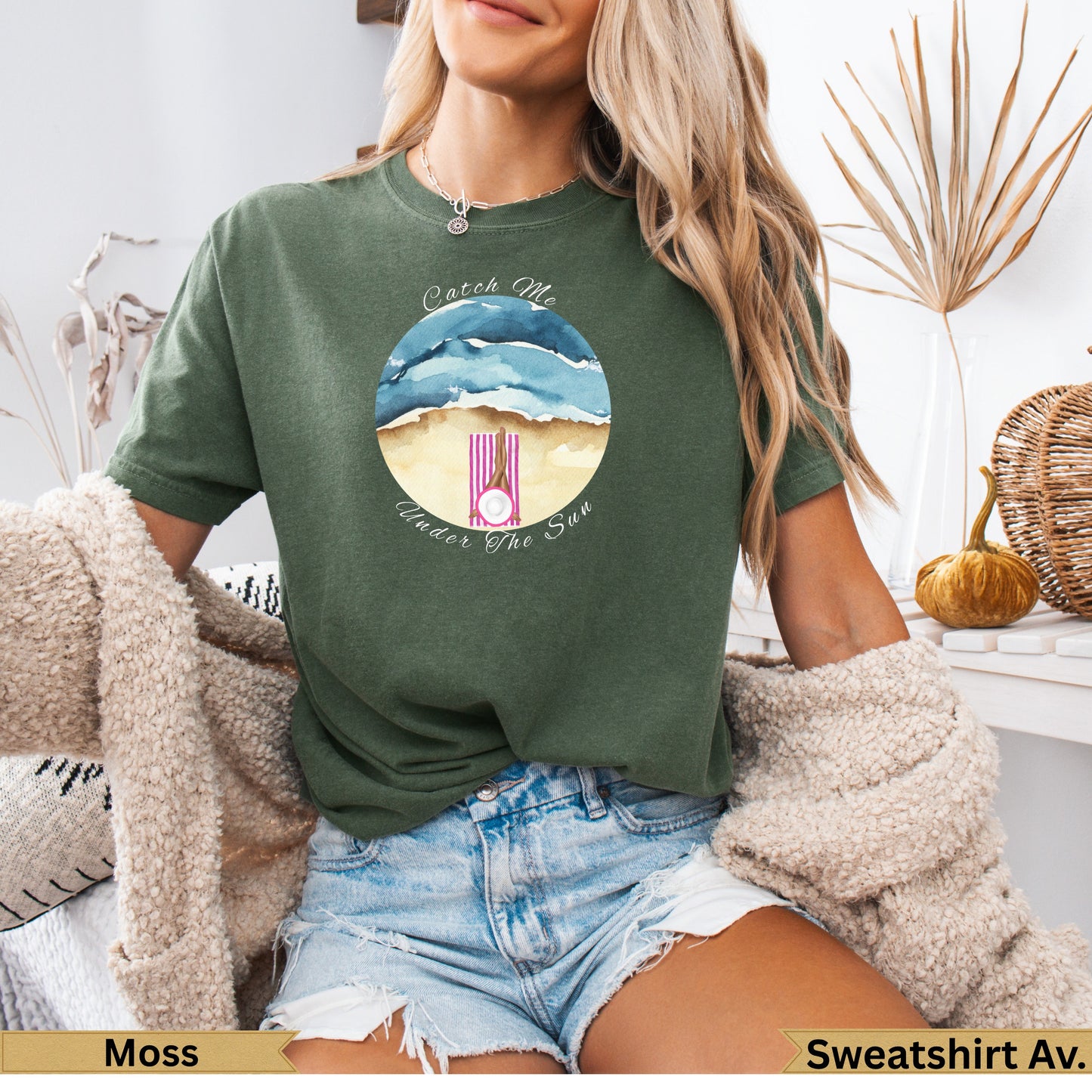 Olive green t-shirt with watercolor beach scene and "Under The Sun" text.