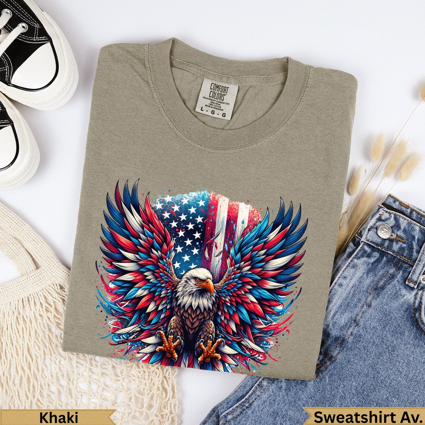 Eagle with American flag wings on khaki sweatshirt, denim and canvas bag.