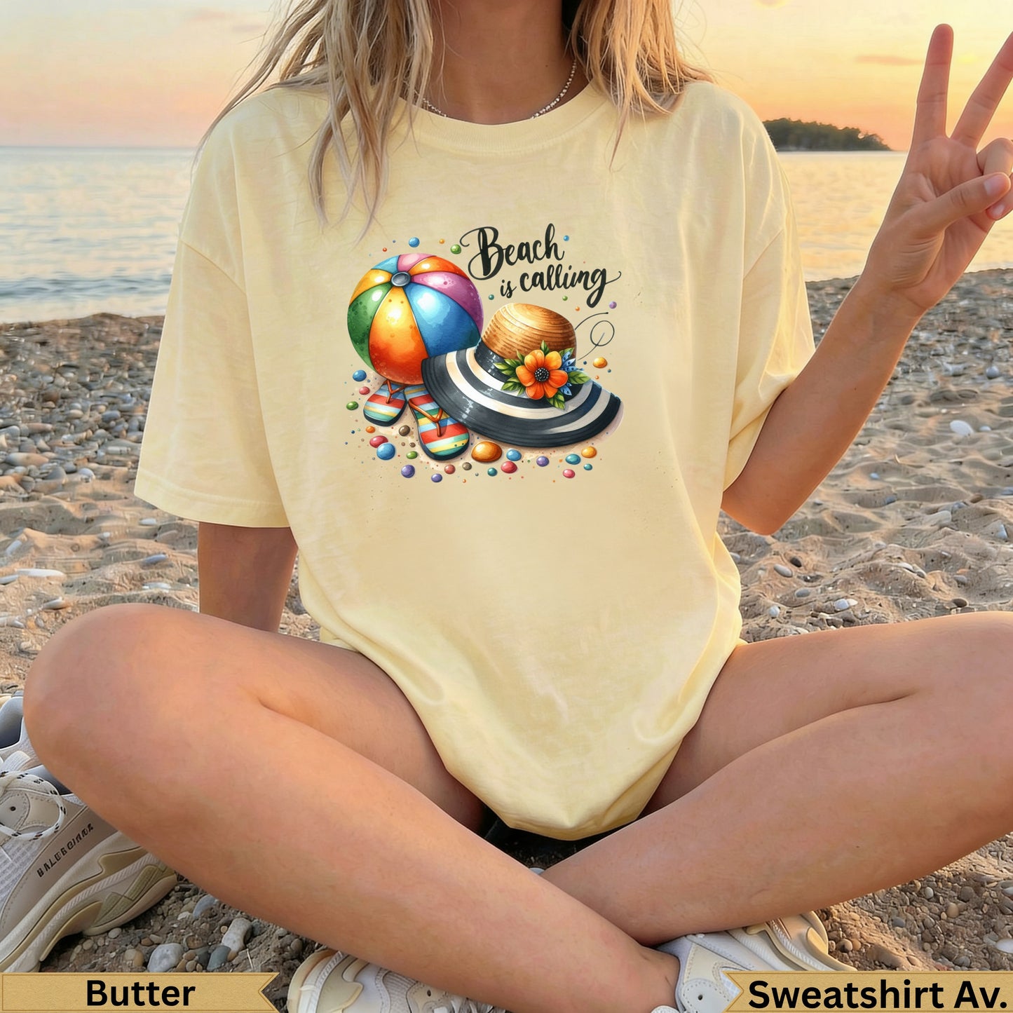 Yellow t-shirt with beach ball, hat, and "Beach is calling" text.