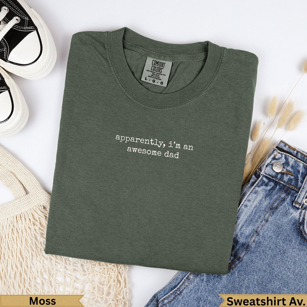 Green t-shirt with "apparently, i'm an awesome dad" text.