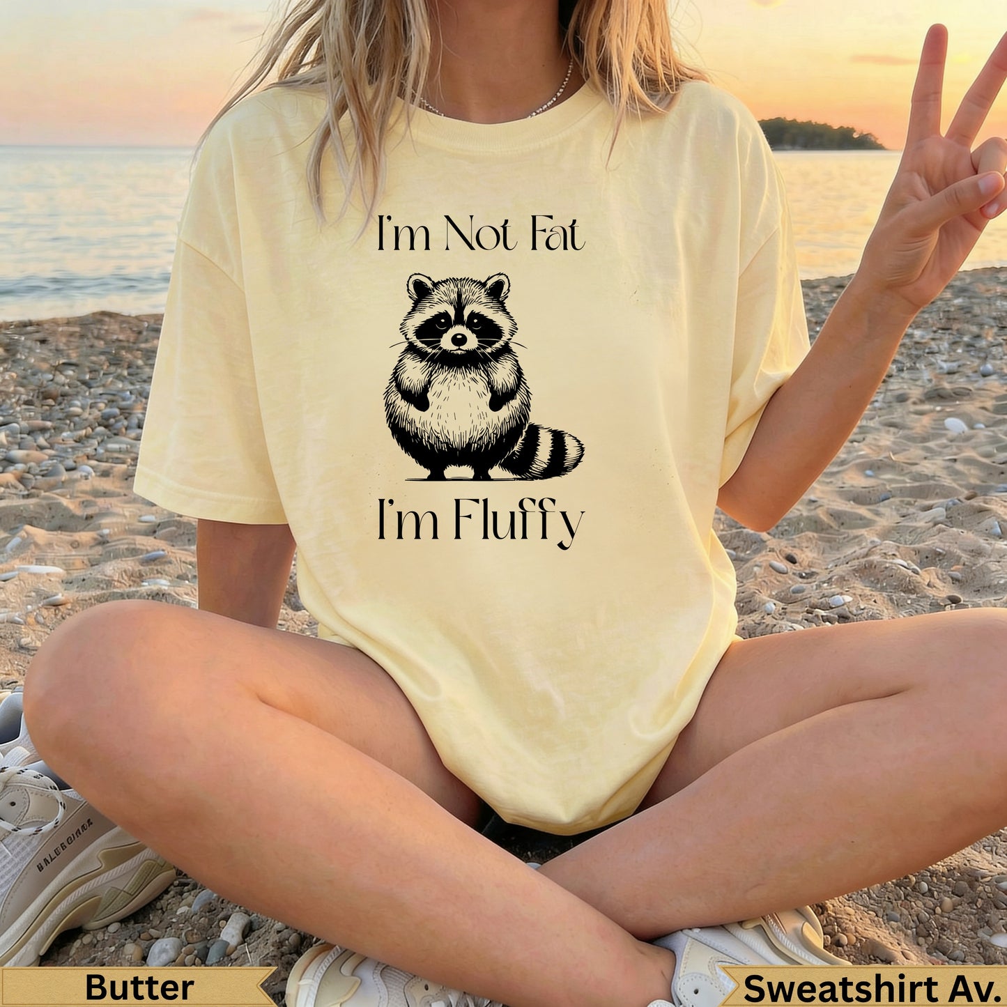 Yellow t-shirt with "I'm Not Fat I'm Fluffy" and a raccoon graphic.