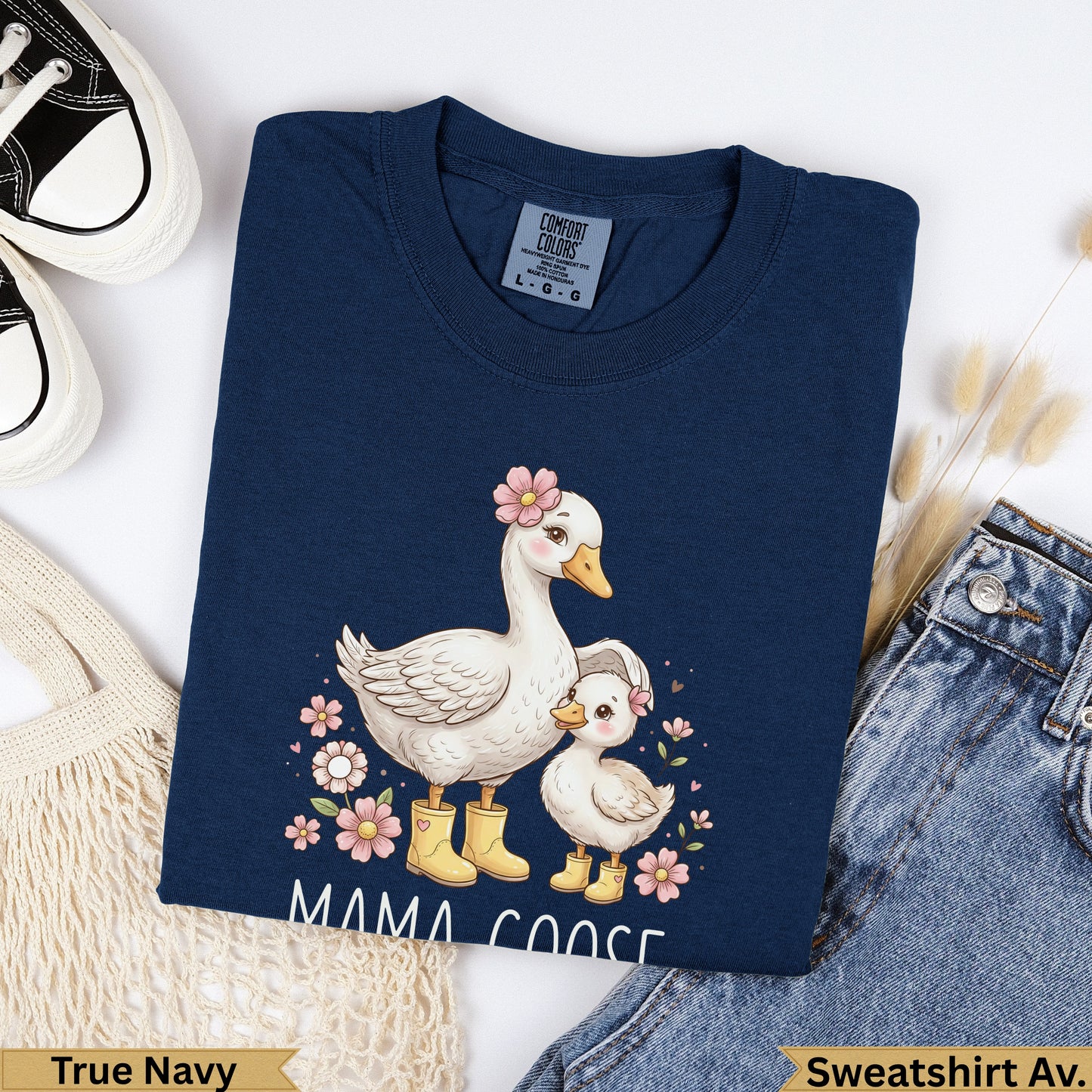 Navy blue sweatshirt with mama and baby geese illustration and "MAMA GOOSE" text.