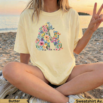 Light yellow crewneck t-shirt with floral bear and cub graphic.
