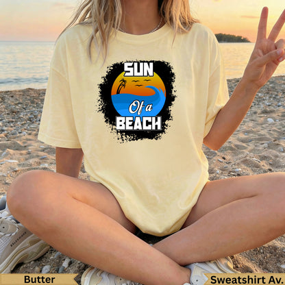 Light yellow t-shirt with "Sun of a Beach" graphic featuring waves and a sunset.