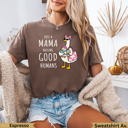 Mama raising good humans graphic on brown t-shirt with goose carrying baby.