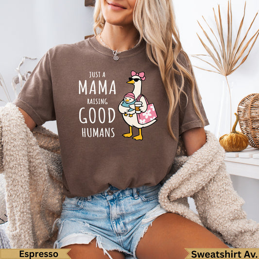 Mama raising good humans graphic on brown t-shirt with goose carrying baby.