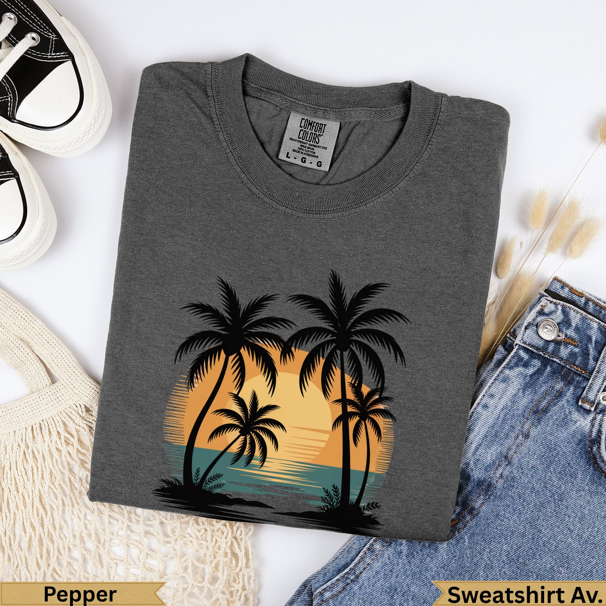 Dark grey crewneck t-shirt with sunset palm tree graphic and "Pepper" text.