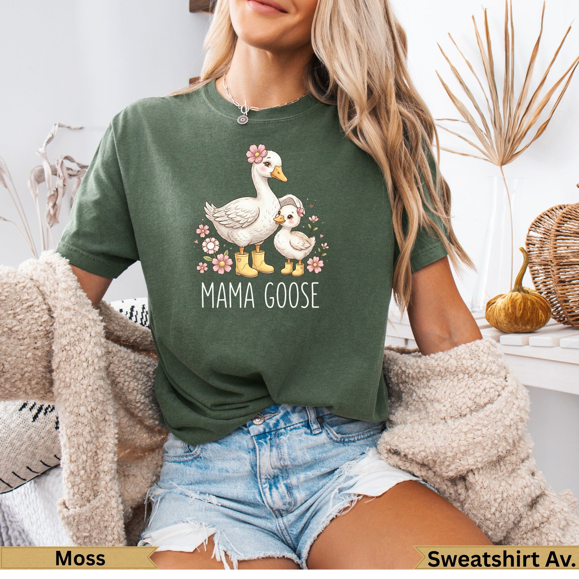 Green t-shirt with "Mama Goose" text and duck illustration.
