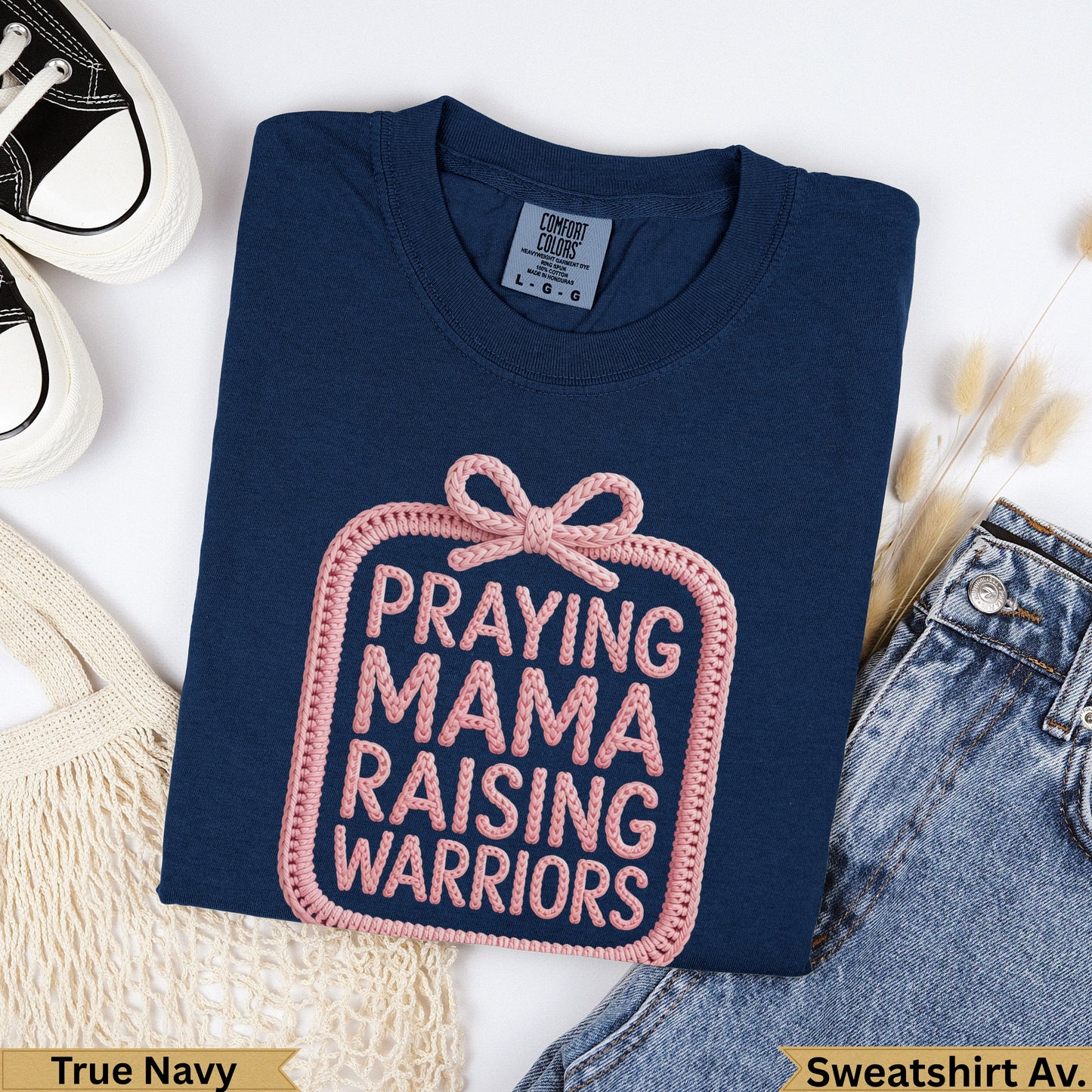 Navy t-shirt with "PRAYING MAMA RAISING WARRIORS" graphic.