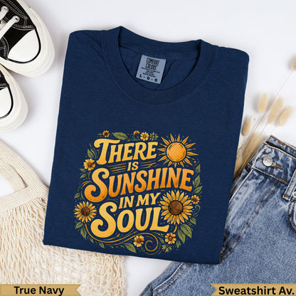 Navy sweatshirt with "There is sunshine in my soul" text and floral design.