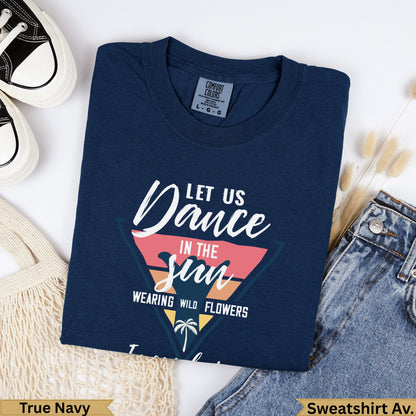 Navy sweatshirt with "Dance in the Sun Wearing Wild Flowers" graphic.