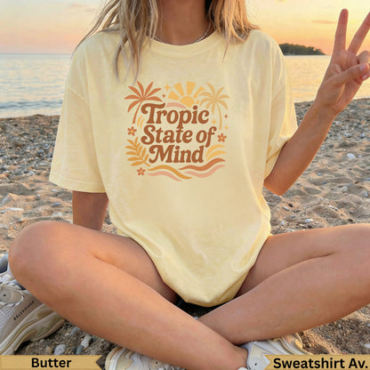 Yellow t-shirt with "Tropic State of Mind" text and palm trees.
