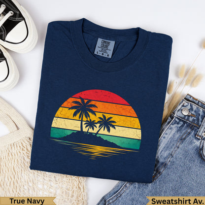 Navy blue crewneck sweatshirt with vintage sunset and palm tree graphic.