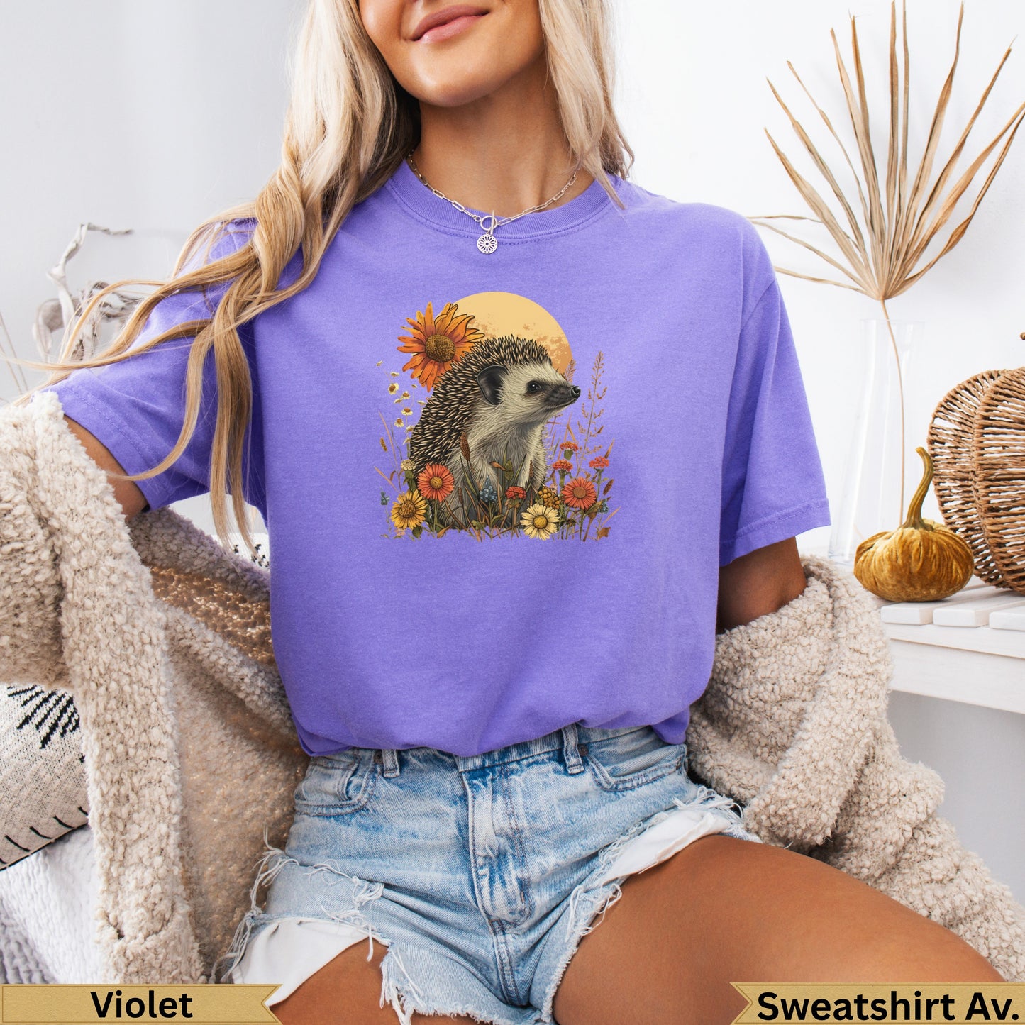 T-shirt with hedgehog and sunflower graphic, "Violet" and "Sweatshirt Av." text.