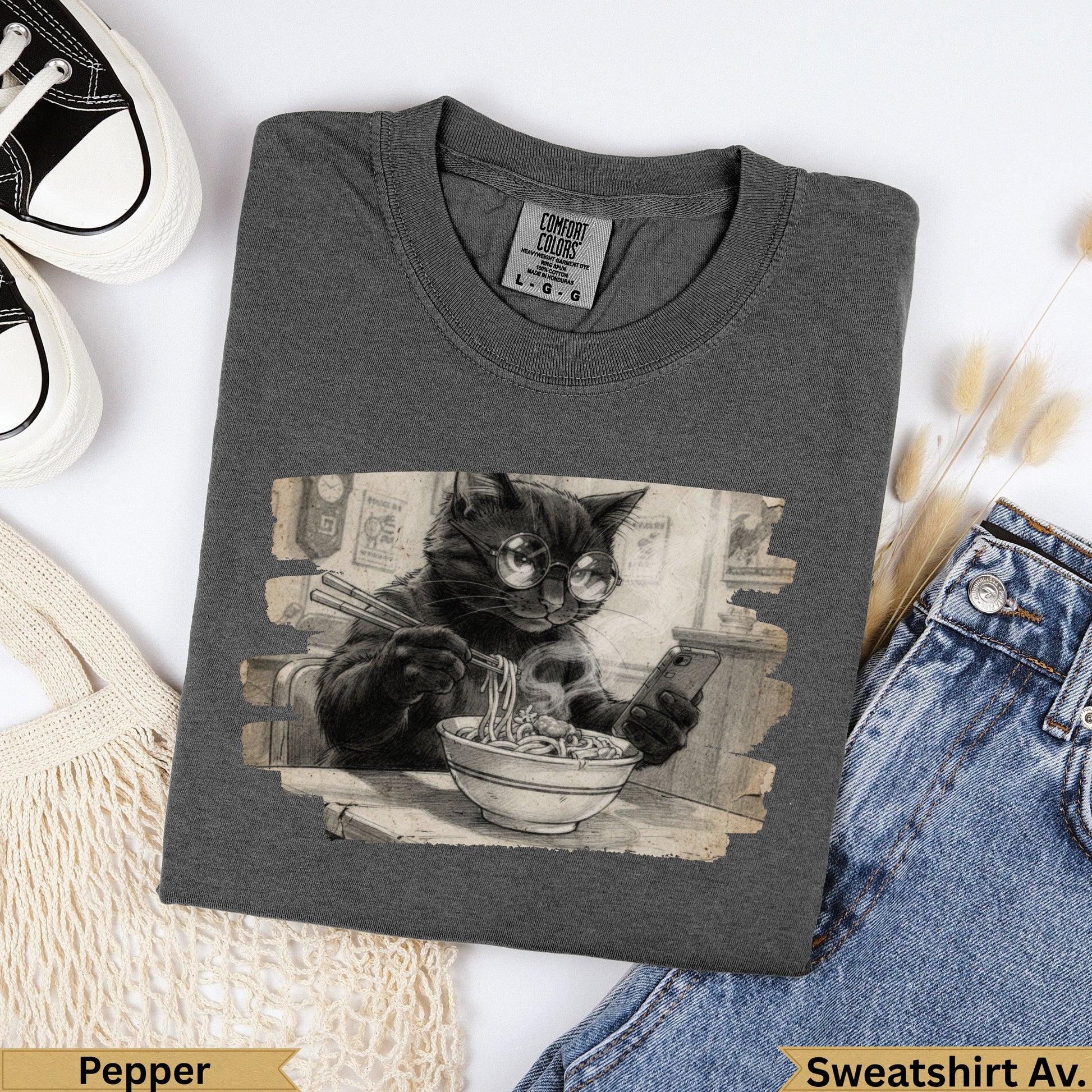 Dark gray Comfort Colors sweatshirt with a cat wearing glasses eating ramen noodles.