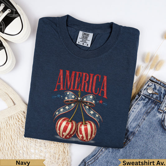 Navy sweatshirt with "AMERICA" and cherry graphic.