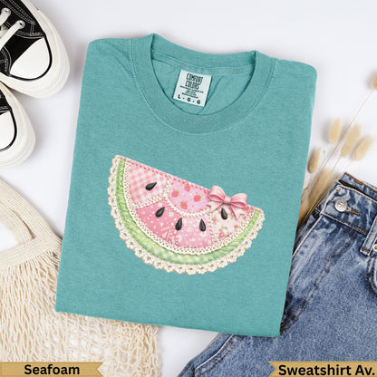 Teal sweatshirt with watermelon patch graphic and "Seafoam" text.