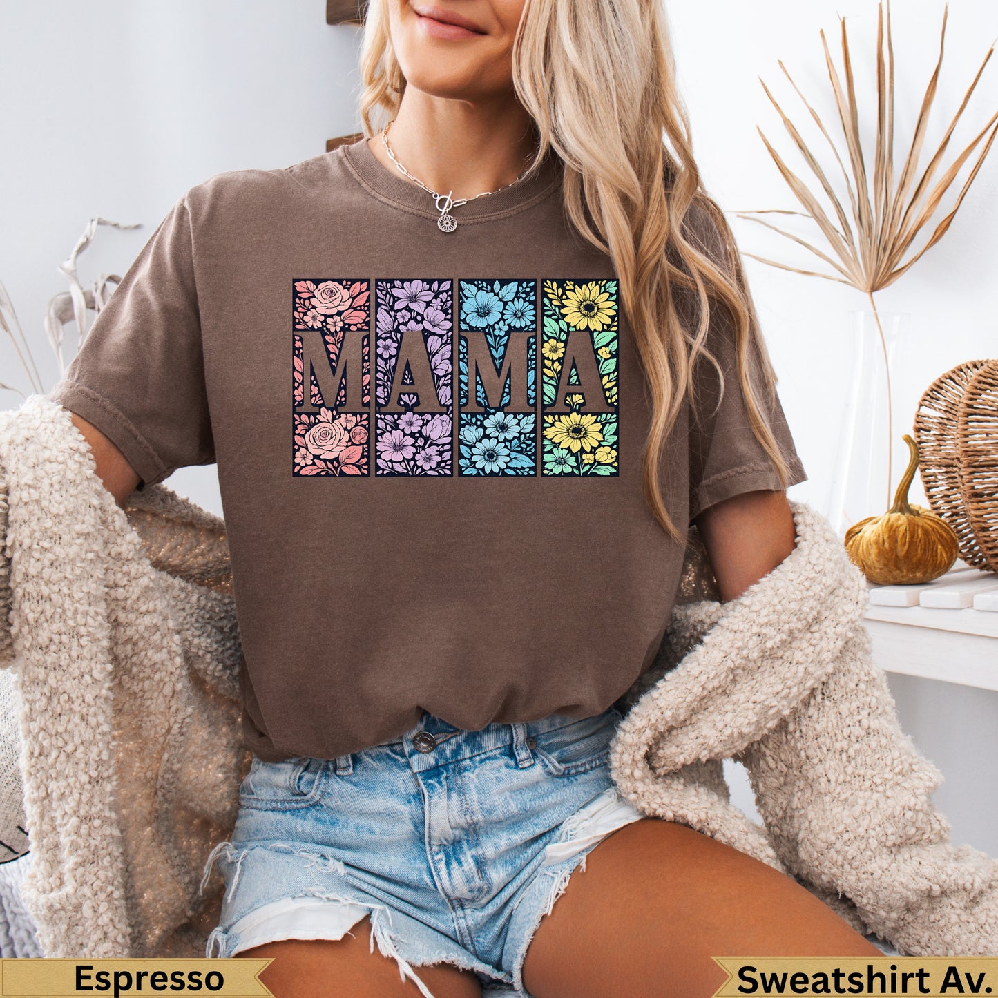 Brown t-shirt with "MAMA" in floral patterned squares.